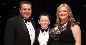 Amanda and Sean with their son Alex at an Aruma fundraising dinner