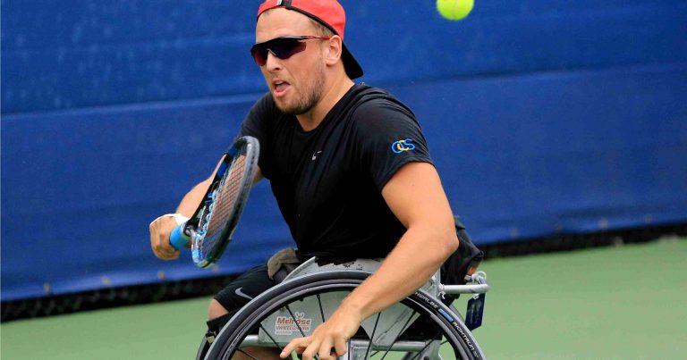 Dylan Alcott playing tennis