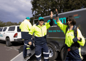 Aruma supported employment photo with two of our supported employees