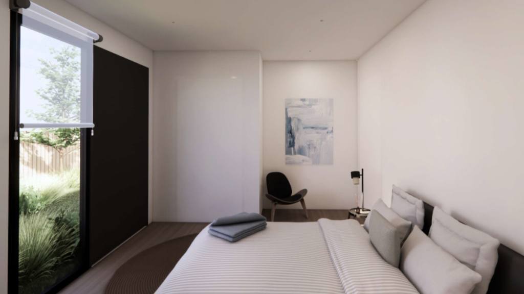 Render of a bedroom inside a Croydon SDA home, showing a double bed, bedside lamp, reading chair and a large floor-to-ceiling window with a garden view.