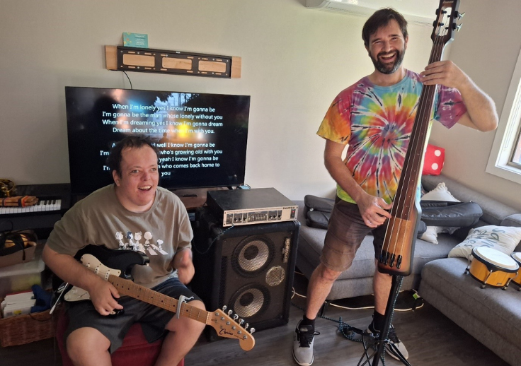 Wade and his support worker Peter jam out with their musical instruments