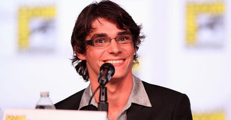 Actor RJ Mitte presenting with a microphone