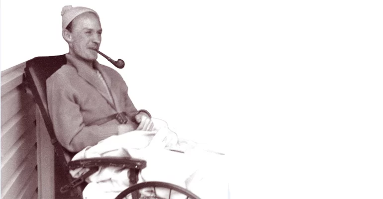 Lionel using a wheelchair after he had contracted polio