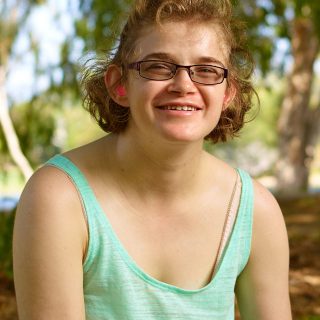 Woman with a disability sitting outside