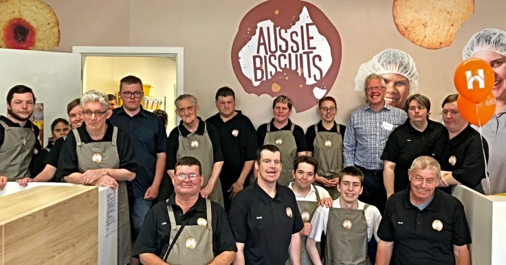 Group of Aussie Biscuits employees at the opening with CEO Andrew Richardson