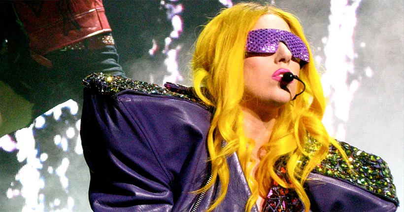 Lady Gaga wearing a costume and performing