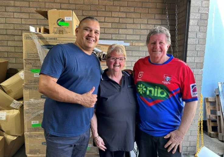 Aruma's Grahame and Ann with Ex Newcastle Knights Player Owen Craigie.