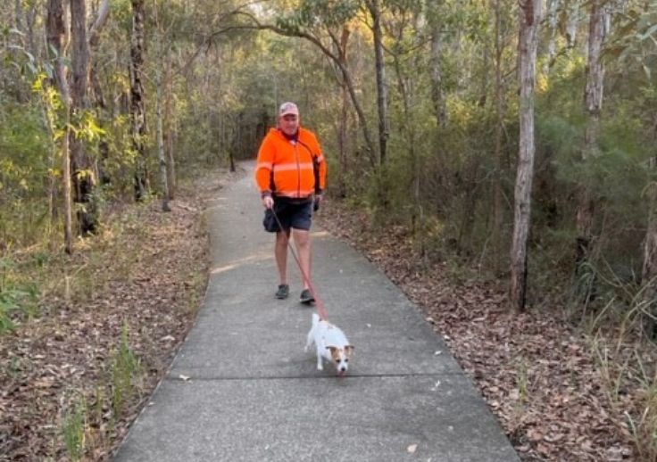 Owen from Maroochydore SIL with his dog Max.
